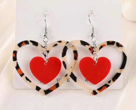 PREORDER VALENTINES DAY ROUND ONE Valentine Leopard Heart Inside Red Heart Acrylic Earrings.